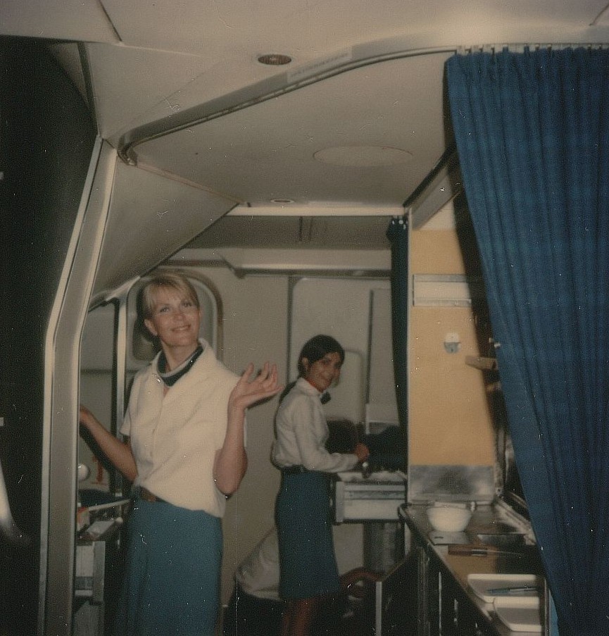 August 3, 1976  two flight attendants prepare in the first class galley of a 747  prior to customer boarding of Pan Am flight 106 from Washington, Dulles to London, Heathrow Airport.
